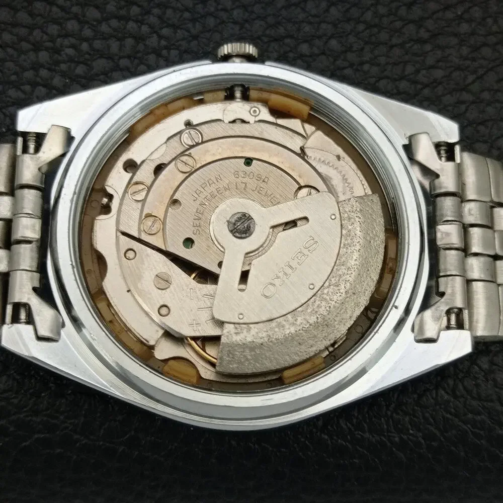 Vintage 1983 Seiko Automatic Mens Silver Watch W/daydate & Arabic accents
